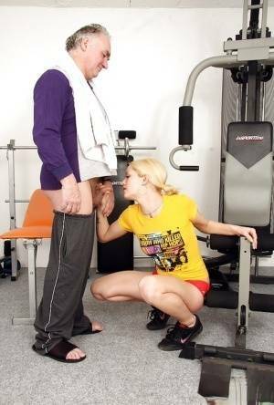 Young fitness chick in pigtails sucks off a much older man's cock on shefanatics.com