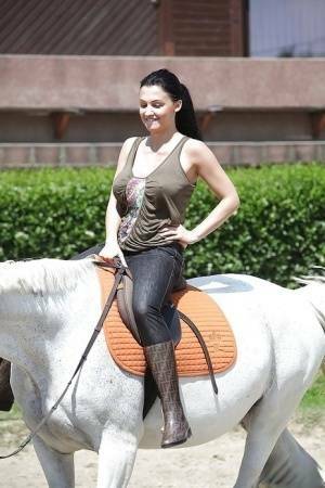 Pornstar Aletta Ocean is riding a horse outdoor in glasses on shefanatics.com