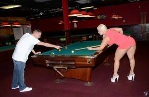 Curvy slut gets nailed on a pool table and jizzed over her big jugs on shefanatics.com