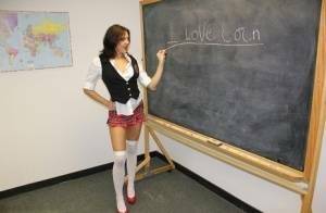 Naughty schoolgirl Cherry Poppins seduces a fellow student in slut wear on shefanatics.com