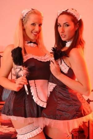 British maids Paige Turnah & Rebecca More have lesbian sex on a bed - Britain on shefanatics.com