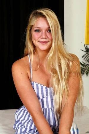 Young blonde Jessie Andrews is all aglow after a fuck and open mouth facial on shefanatics.com