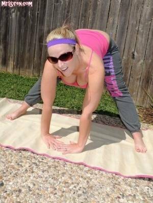 Blonde chick Dee Siren frees her huge ass from yoga pants outdoors on yoga mat on shefanatics.com