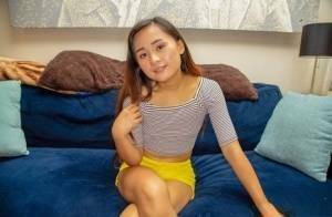 Petite Asian teen Elle Voneva engages in POV sex with a white cock on shefanatics.com