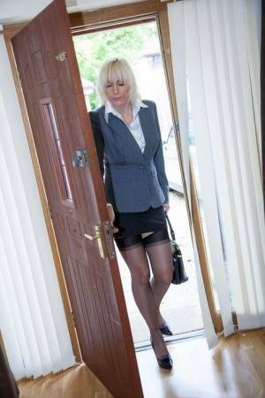 Older MILF Jan Burton strips off business clothes after a hard day at office on shefanatics.com