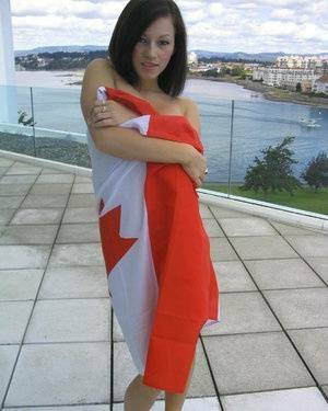 Teen amateur Kate wraps her naked body up in a Canadian flag on shefanatics.com