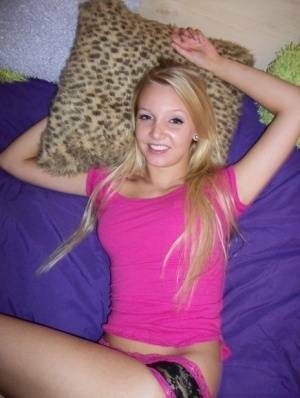 Cute teen girl with blonde hair shows off her tits and twat for the first time on shefanatics.com