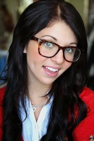 Glasses on round face of cute girl Madelyn Monroe stress her tiny tits on shefanatics.com
