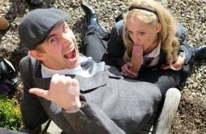 Blonde schoolgirl Loulou licks and sucks a huge dick while outdoors on shefanatics.com