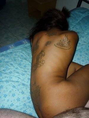 Tattooed Thai girl Nit getting banged bareback on bed by sex tourist - Thailand on shefanatics.com