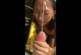 Tiny Asian gets covered in Cum on shefanatics.com