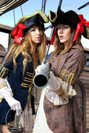 Female pirates partake in lesbian foreplay while on board a vessel on shefanatics.com