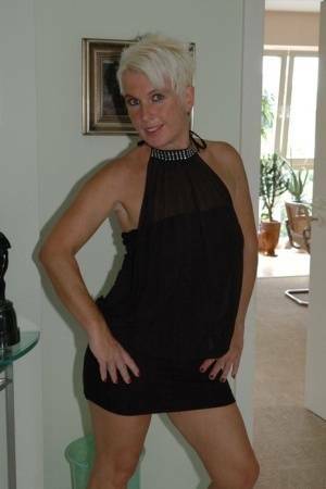 Blonde mature Claudia stipping out of a black dressAmateur,Mature,Stripping on shefanatics.com