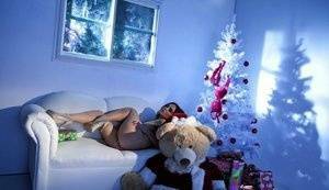 Hot girl Natasha Nice masturbates with a vibrator while alone at Christmas on shefanatics.com