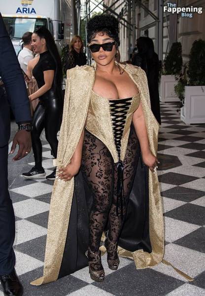 Lil’ Kim Flashes Her Areola as She Attends the Christian Siriano Fashion Show (32 Photos) - Usa on shefanatics.com